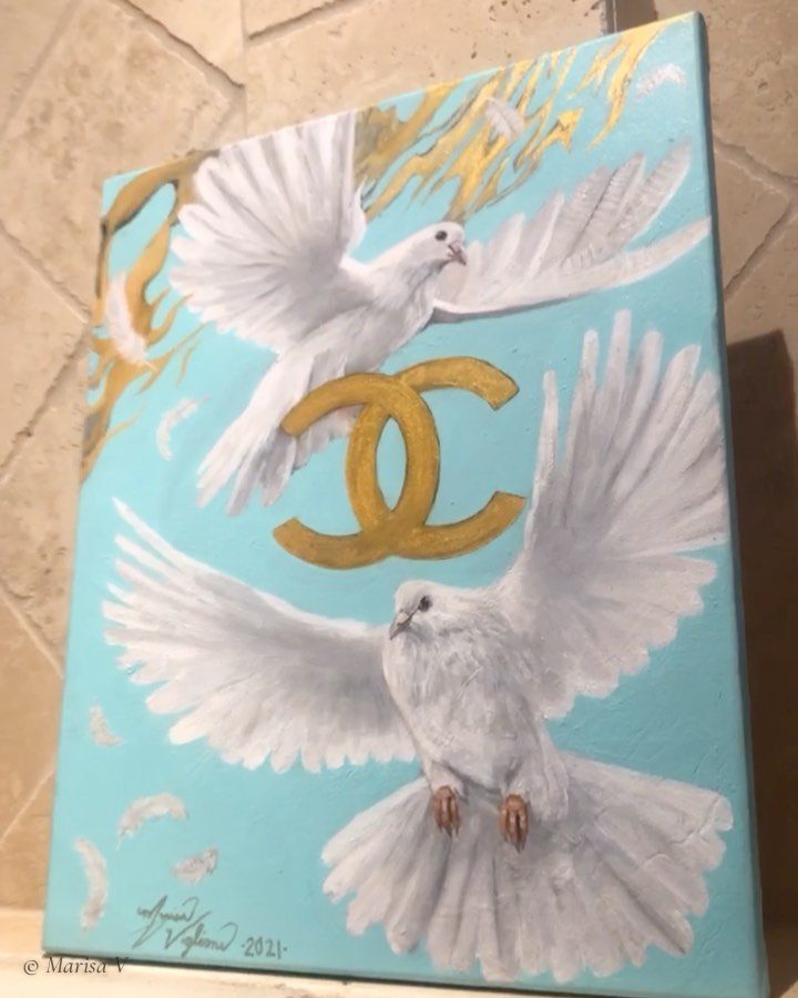 Painting of two white doves with outspread wings around a gold emblem, on a pale turquoise ground.