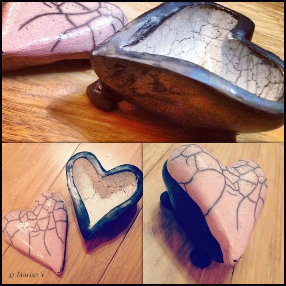 Heart-shaped ceramic box, black outside and crackled white inside, with a crackled pink lid.
