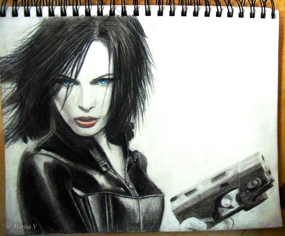 Charcoal drawing in a spiral sketchbook: a dark-haired woman with blue eyes and red lips, in black leather, holding a pistol.